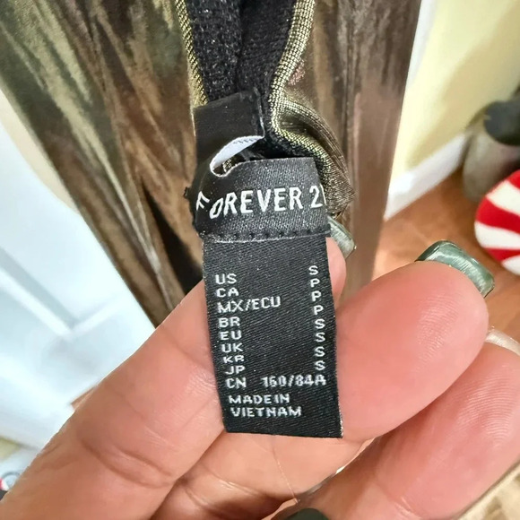 Midi Slip Dress, Liquid Metal bronze/gold color, bodycon, gorgeous!!
Small/XS - Picture 6 of 11